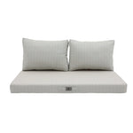 Finition et coutures coussin beige chiné turquoise