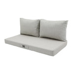 Coussin beige chiné turquoise 120x60 cm en situation extérieure