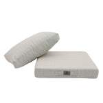 Détail tissu coussin beige chiné turquoise