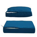 Ensemble de 4 coussins pour salon de jardin en tissu bleu pétrole, déhoussables et anti-UV, pour fauteuils et canapés.