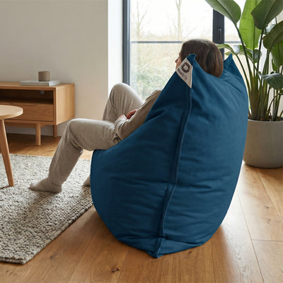 Détail tissu pouf bleu pétrole