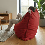 Détail tissu pouf rouge piment