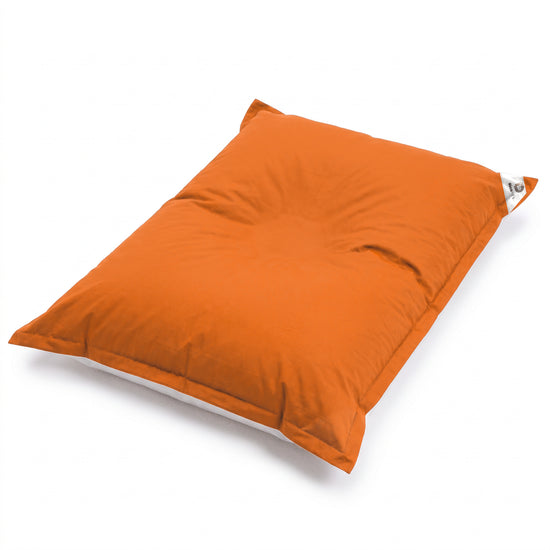 Orange giant floating bean bag on a white background, high-angle view