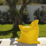 Pouf géant XXL jaune miel pour extérieur, déhoussable et imperméable, mousse confortable, idéal pour salon ou jardin.