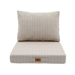 Finition et coutures coussin beige chiné noir