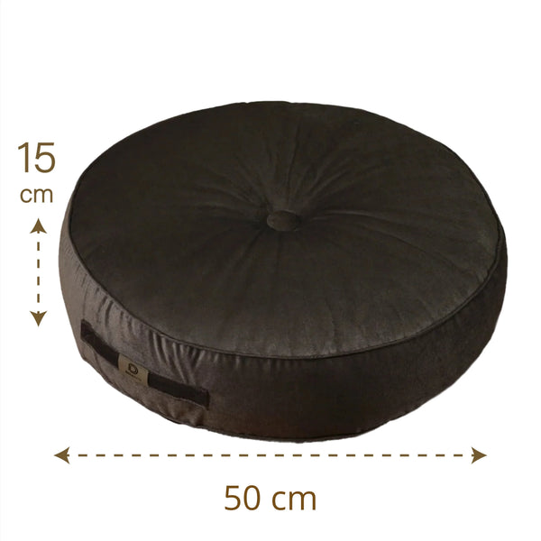 Ambiance jardin avec pouf gris foncé