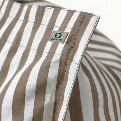 Détail tissu pouf beige