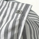 Détail tissu pouf gris clair