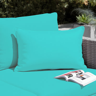 Deux coussins d'appoint décoratifs 60x35 cm en tissu bleu Caraïbes, déhoussables, pour décoration de jardin.