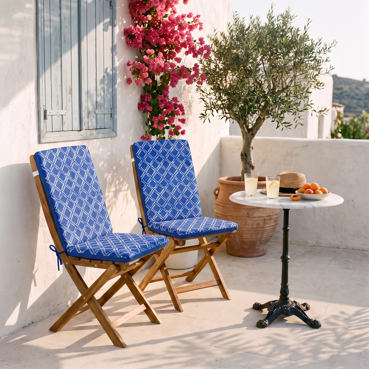 95x40 high-back chair cushions, Blue Nautical Pattern, on folding chairs on a terrace