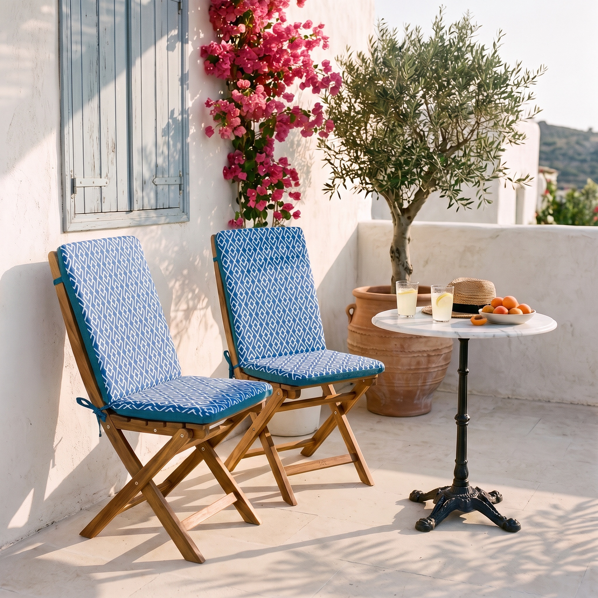 95x40 high-back chair cushions, Green Geometric Pattern, on folding chairs on a terrace