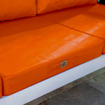 Ensemble de coussins de salon jardin orange 50x50 cm, déhoussables et anti-UV pour fauteuils et canapés.