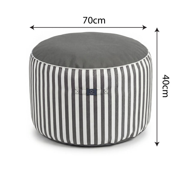 Ambiance jardin avec pouf gris foncé