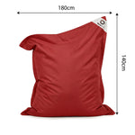 Ambiance jardin avec pouf rouge piment