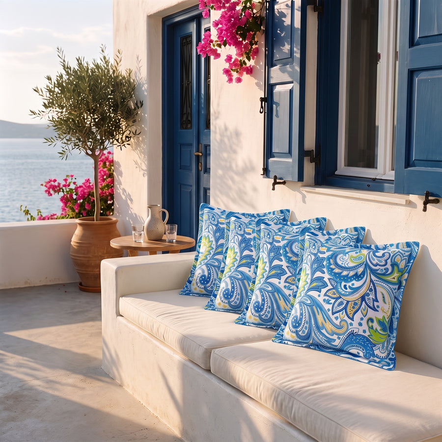 Set of 4 decorative cushions 45x45, Arabesque pattern, on a terrace bench facing the sea