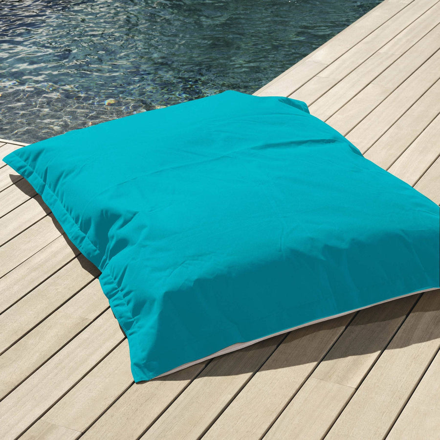 Pouf géant flottant Deco-arts.fr en bleu Caraïbes, beanbag XXL déhoussable pour piscine avec billes.