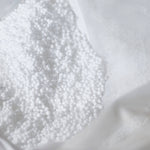 Pouf géant flottant en billes bleu Caraïbes, déhoussable, pour piscine, format XXL, par Deco-arts.fr