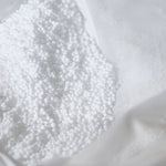 Pouf géant flottant rouge piment Deco-arts.fr, grand beanbag déhoussable pour piscine et extérieur, 180x140 cm avec billes