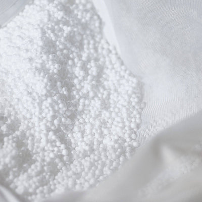 Pouf flottant géant pour piscine Deco-arts.fr, taille 170x90 cm, orange, confortable, extérieur, matelas hamac à billes.